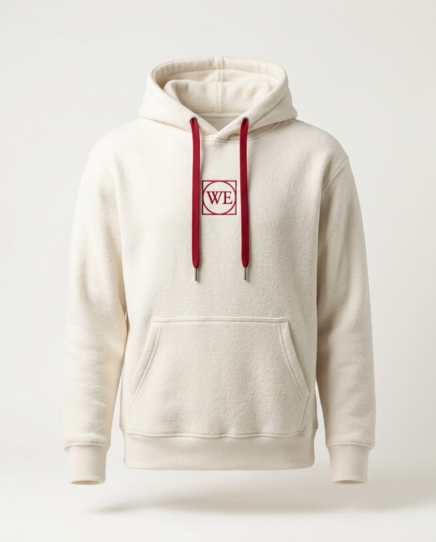 Bone white hoodie with red drawcords and a red WE monogram on the chest