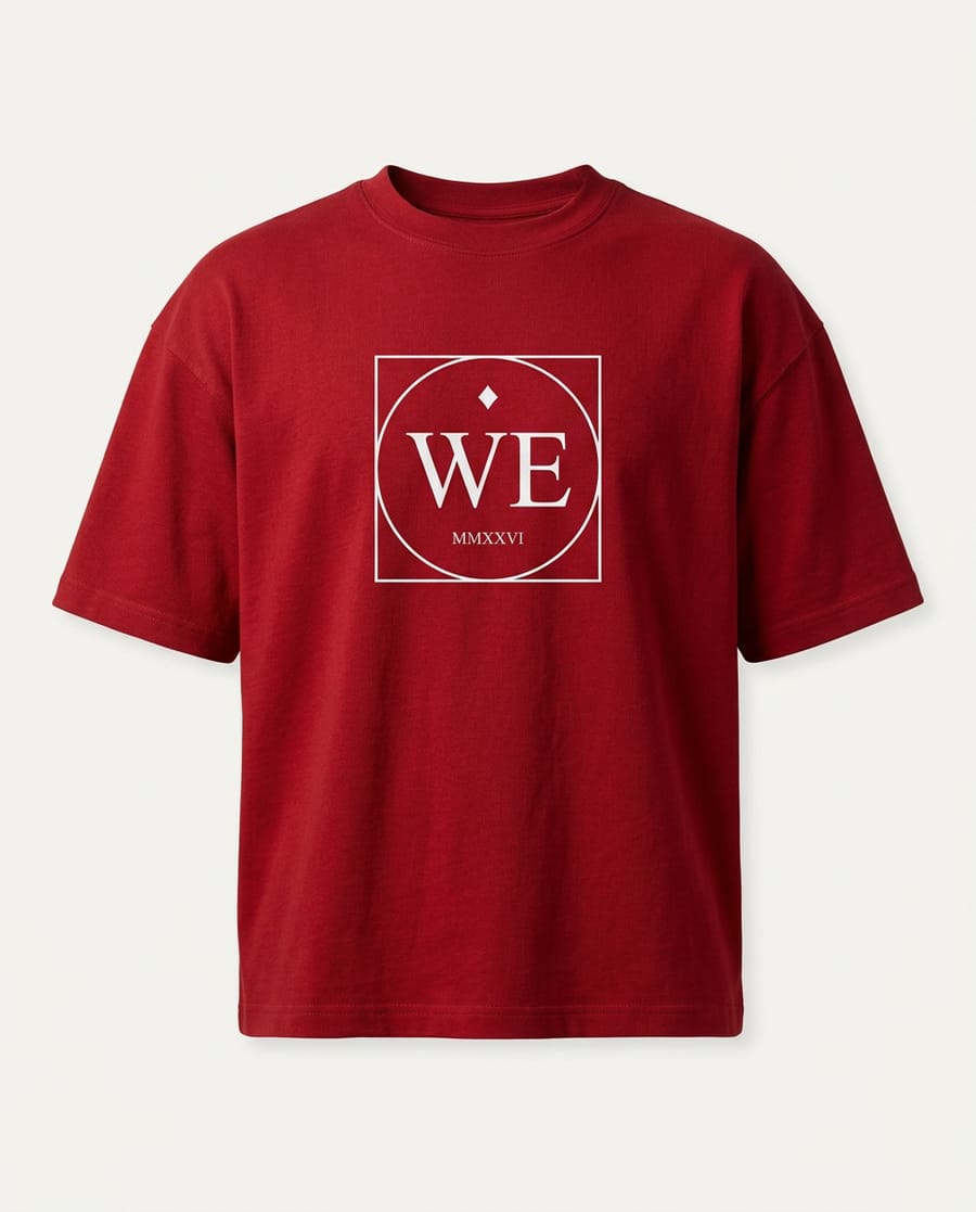 Red heavyweight tee with a large white WE monogram on the chest